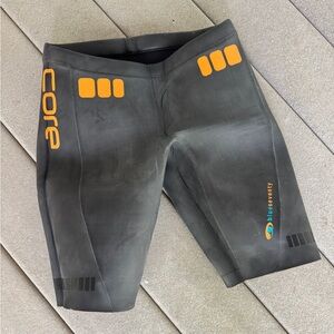 Blueseventy Men’s Swim core shorts for buoyancy in Black with Orange Accents
